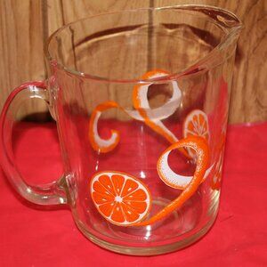 Glass Pithcer with Orange theme decorations